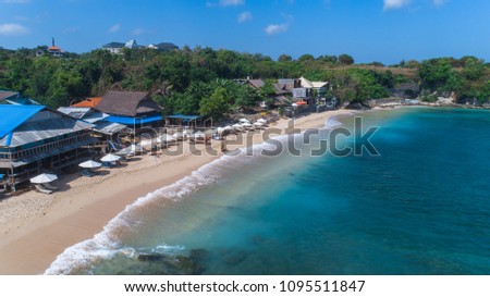 Balangan. Sandy beach with sun umbrellas.  Aerial picture taken from drone. Bali. Indonesia. May 2018.