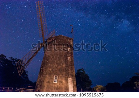 Photograph of an East Hampton mill at dusk with the stars, Long Island, New York.