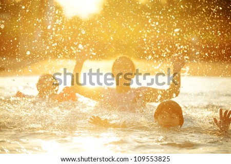 Happy children playing on hot summertime