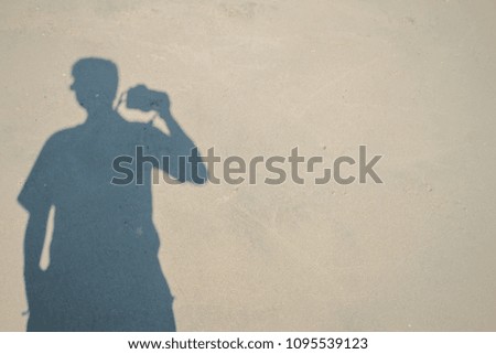 Abstract silhouette photographer on the beach