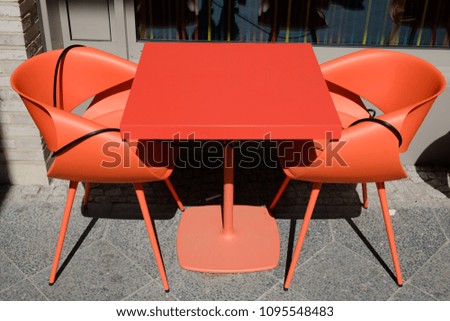 orange table and chairs