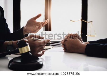 notary consultant concept , Judge gavel with client consult lawyer lawsuit bankruptcy of her. Concepts of law. Royalty-Free Stock Photo #1095575156
