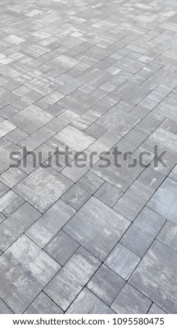 Paving slabs. Background of paving tiles. Construction industry