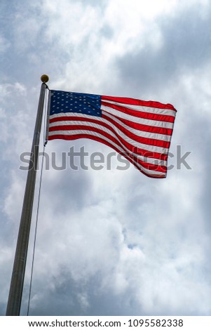 American Flag Swinging on Pole