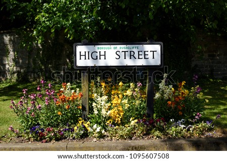 High Street name and flowerbed  in the village of Orston in Nottinghamshire,UK.