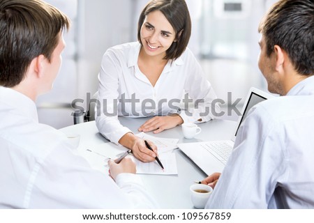 Group of business people busy discussing financial matter during meeting Royalty-Free Stock Photo #109567859