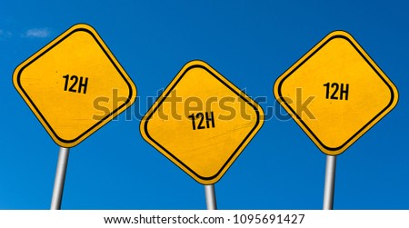 12h - yellow sign with blue sky