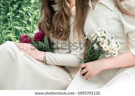 bouquet in girl's hand