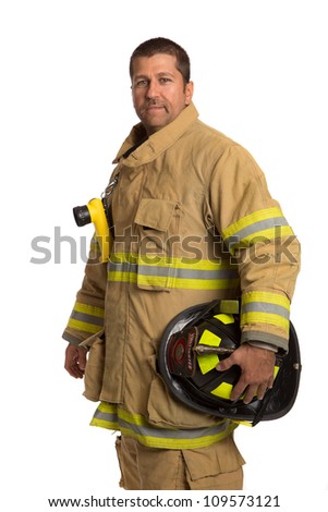 Serious looking confident firefighter standing portrait isolated on white