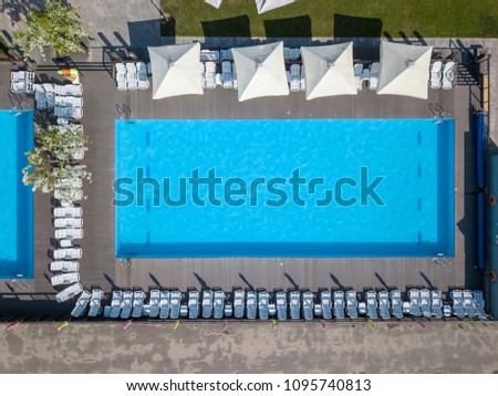 pool in mediterranean garden architecture in top view. Photo from the drone
