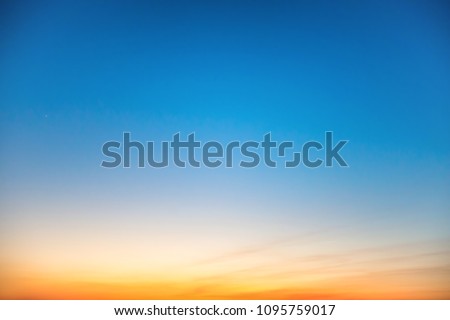 Sunset in the sky with blue, orange and red dramatic colors
