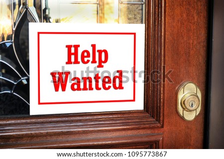 Help wanted sign on front door.