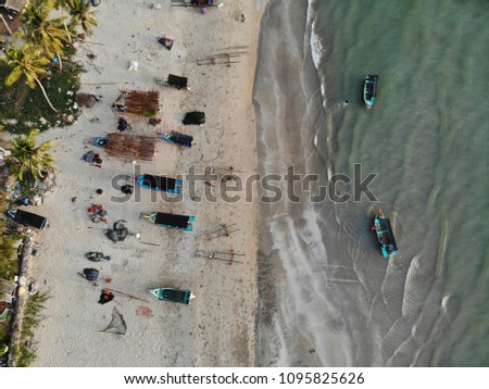 Top View, Aerial Shot of Local Fisherman Village Along The Ocean