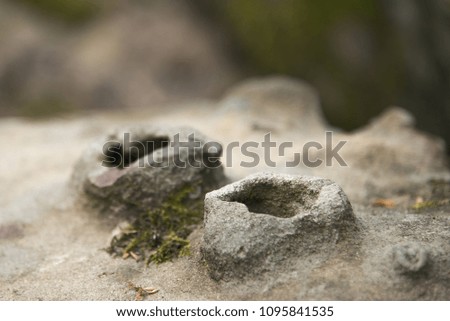 Stone craters on a rock