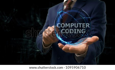 Businessman shows concept hologram Computer coding on his hand. Man in business suit with future technology screen and modern cosmic background