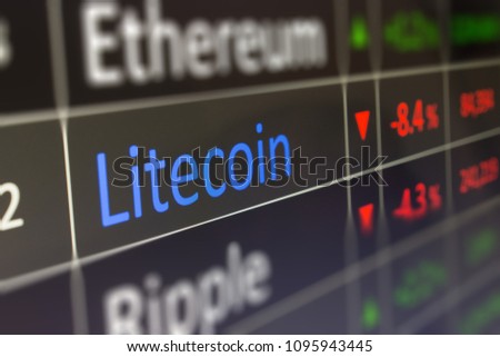 Litecoin crypto currency trading and monitoring LTC values on trading chart of exchange screen.  Closeup of financial buying and selling of Litecoin.  Copy space.