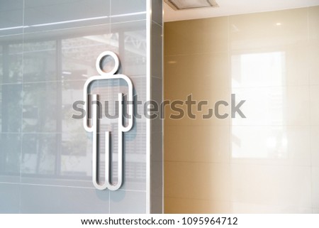 An entrance to the male toilet
