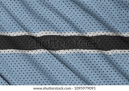 Botswana flag printed on a polyester nylon sportswear mesh fabric with some folds