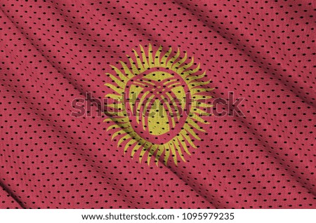 Kyrgyzstan flag printed on a polyester nylon sportswear mesh fabric with some folds