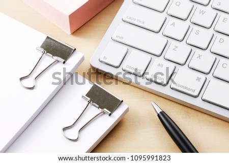 Keyboard and pen closeup business image