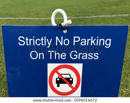 Stricly No Parking On The Grass. Transportation sign