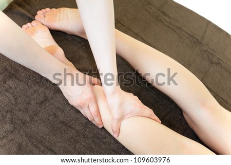 The woman who receives foot massage
