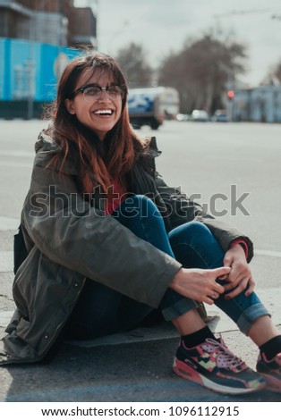 girl smiling with glasses
