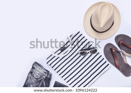 summer striped clothes collage on white,sunglasses,starfish, , hat, jeans, shoes , flat lay, top view
