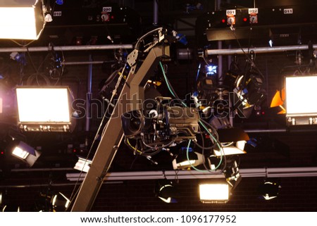 camera record on crane in production on studio and light to stage for entertainment industry
