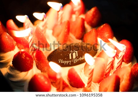strawberry shortcake ice cream and candle light for happy birthday celebrate 