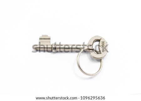 Old key isolated on a white background.