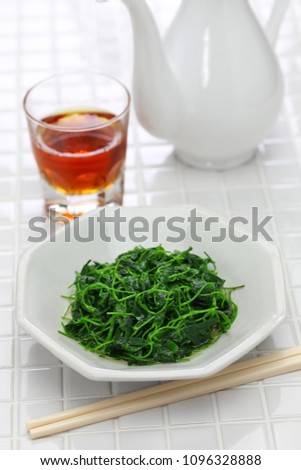 chinese white wine stir fried with toothed bur clover, shanghai cuisine