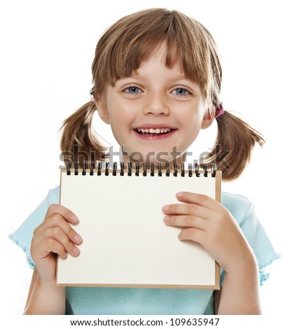little girl holding empty white notebook isolated on white background