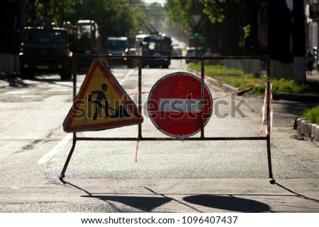Stop! Repair sidewalk. Work ahead road sign