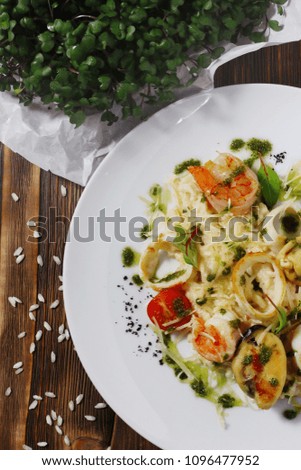 risotto with shrimps and squid with greeny