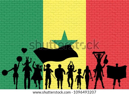 Senegalese supporter silhouette in front of brick wall with Senegal flag. All the objects, silhouettes and the brick wall are in different layers. 
