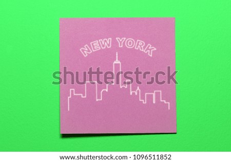 New York silhouette on purple paper