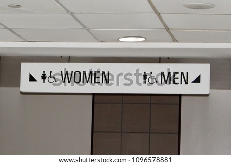 Men and Women Bathrooms Sign