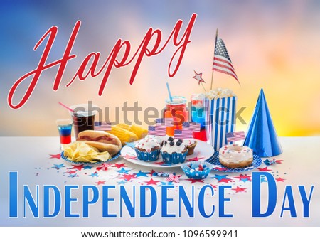 national holidays, celebration and patriotism concept - food and drinks decorated for american independence day party over evening sky background