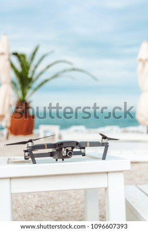 drone is on a table by the sea