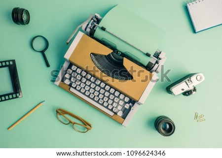 Retro journalist workplace desk minimal yellow and green creative concept