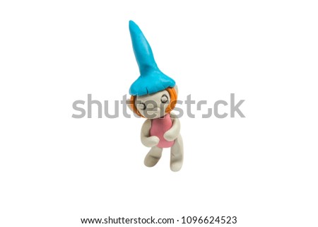 Cute girl made by clay sculpting isolated on white background (with clipping path)