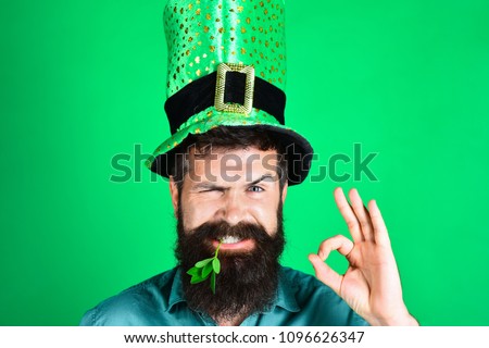 St Patrick's Day. Bearded man in green men hats celebrate Patricks Day. St Patrick's Day Party. Green men hat or top hats. Green hat with clover. Saint Patrick having fun. Ireland traditional.