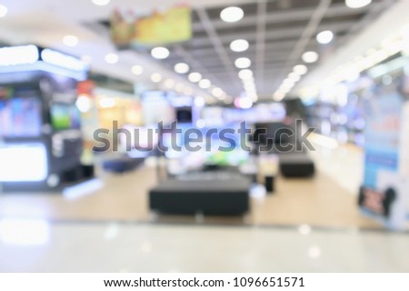 eletronic department store show Television TV and home appliance with bokeh light blurred background
