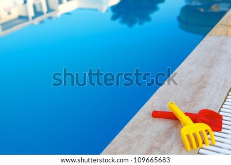 Pool with blue water and toys