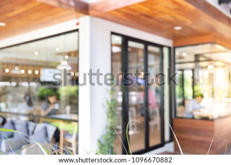 Abstract blurred restaurant window - vintage style picture with bokeh light.