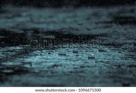 Rain water drop falling to the floor in rainy season
