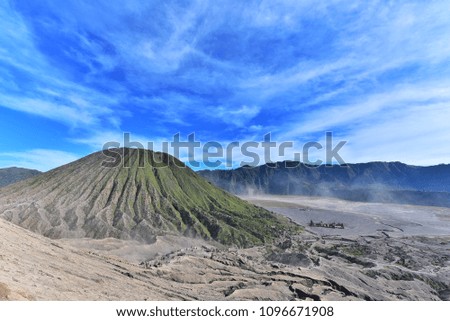Kawah Bromo, Mount Bromo in Bromo Tengger Semeru National Park, is an active volcano and part of the Tengger massif, in East Java, Indonesia.