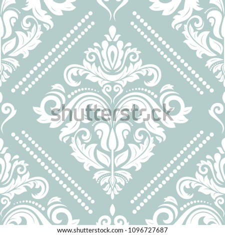 Classic seamless vector pattern. Damask orient ornament. Classic vintage light blue and white background. Orient ornament for fabric, wallpaper and packaging