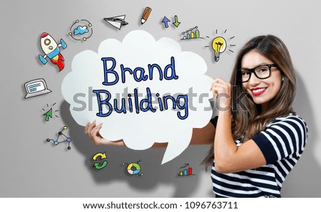 Brand Building text with young woman holding a speech bubble